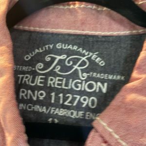 Used True Religion button down shirt. size says XL but fits more like a large.